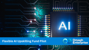 A dark background, with a computer chip lit up in blue with the letters "AI" glowing in the middle. A blue banner along the bottom, with "Flexible AI Upskilling Fund Pilot" written in white letters. Omagh Enterprise logo within the blue banner