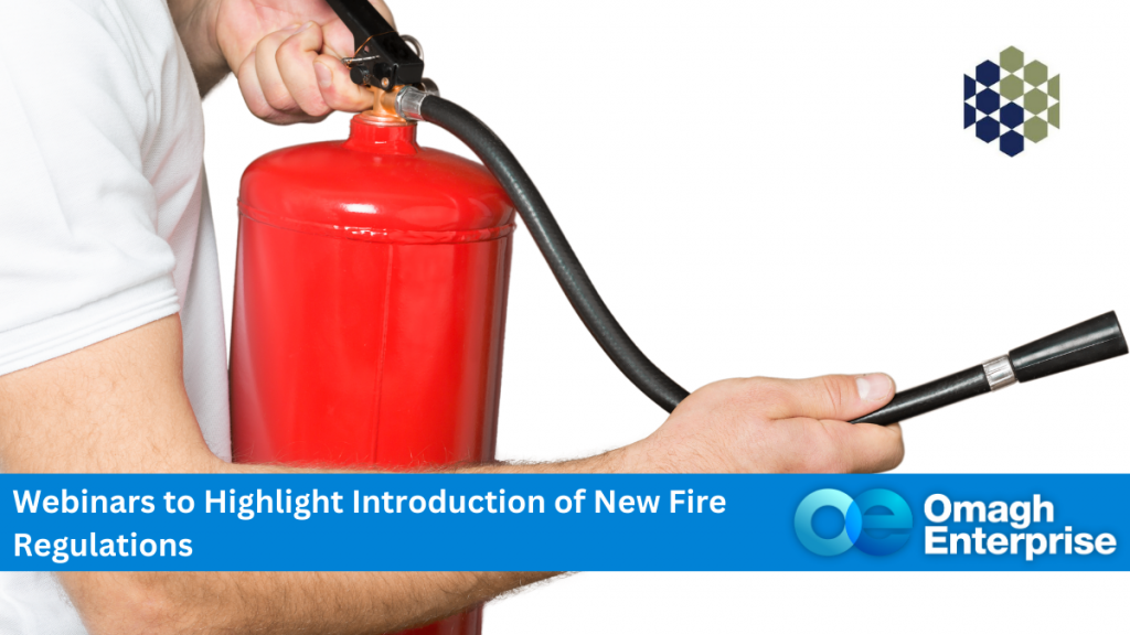 A person holding a red fire extinguisher with a blue banner below. The banner reads, Webinars to Highlight Introduction of New Fire Regulations, and includes the Omagh Enterprise logo.