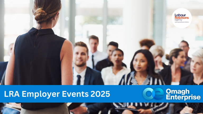 A woman stands facing a seated audience in a conference room. Text reads "LRA Employer Events 2025" and "Omagh Enterprise.