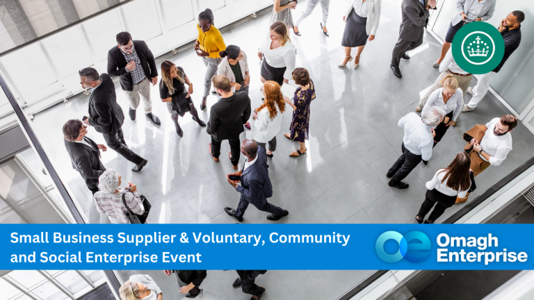 People mingling at an event. They stand and converse in groups on a spacious, tiled floor. A blue banner at the bottom reads, Small Business Supplier & Voluntary, Community and Social Enterprise Event - Omagh Enterprise.