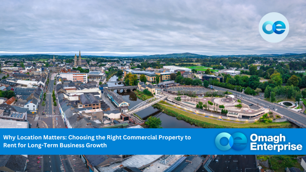 Aerial view of Omagh town with a river, bridge, and surrounding buildings; text overlay discusses choosing commercial property for long-term business growth by Omagh Enterprise.