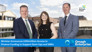 Pictured at the launch of a new round of Access to Finance funding are (L-R) Kieran Donoghue, Invest NI CEO, Economy Minister Dr Caoimhe Archibald and Ian Maxwell, Invest NI Executive Director Finance. Blue banner with OEC logo. White text "Minister Announces £250million Access to Finance Funding to Support Start-Ups and SMEs"