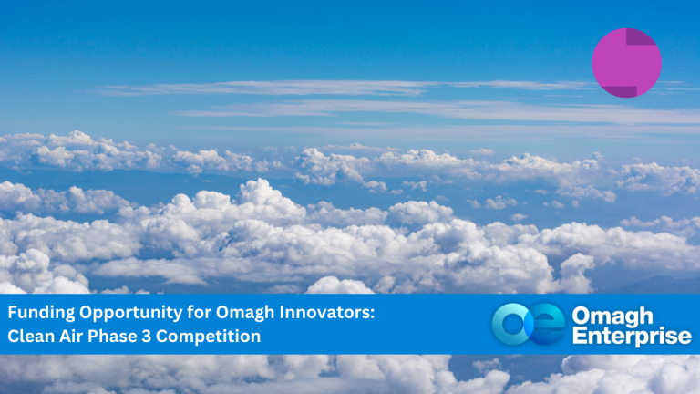 A blue sky with white clouds, overlaid with text promoting a Clean Air Phase 3 funding competition by Omagh Enterprise.