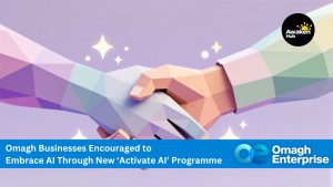 Two stylized hands, one human and one robotic, shake hands against a pastel background. A banner promotes Omagh businesses engaging with AI through the “Activate AI” programme.