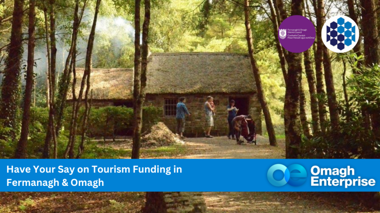 A family stands outside a thatched cottage in a wooded area at the UIster-American Folk Park near Omagh. Logos and text promote tourism funding consultation in Fermanagh and Omagh, presented by Omagh Enterprise.