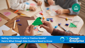 People making Christmas crafts with paper and decorations at a table, alongside a banner promoting tips for selling festive goods from Omagh Enterprise.