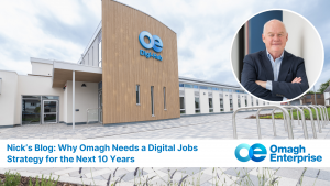 Modern building labeled "OE DigiHub" with inset photo of a man in a suit, and text about Omagh's need for a digital jobs strategy for the next 10 years from Omagh Enterprise.