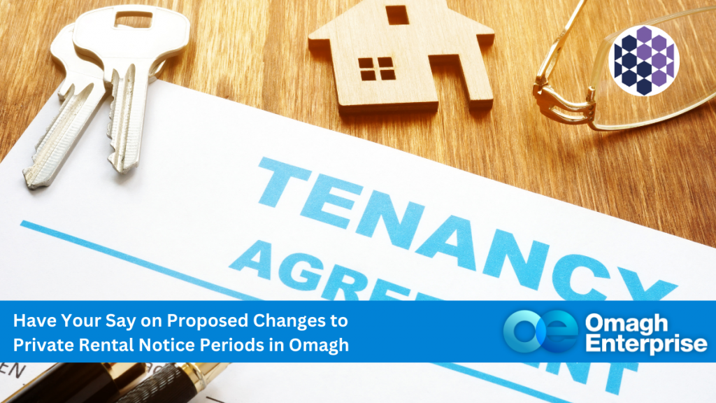 Set of house keys, a wooden house model, glasses, and a tenancy agreement document on a desk, with an Omagh Enterprise banner about private rental notice period changes.