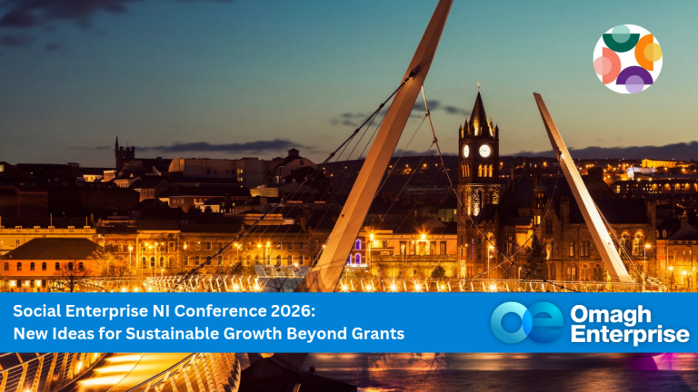 A view of a modern pedestrian Peace Bridge, in Derry city, lit at dusk with a city skyline and Guildhall in the background. A banner reads: “Social Enterprise NI Conference 2026: New Ideas for Sustainable Growth Beyond Grants.” Omagh Enterprise logo is visible.