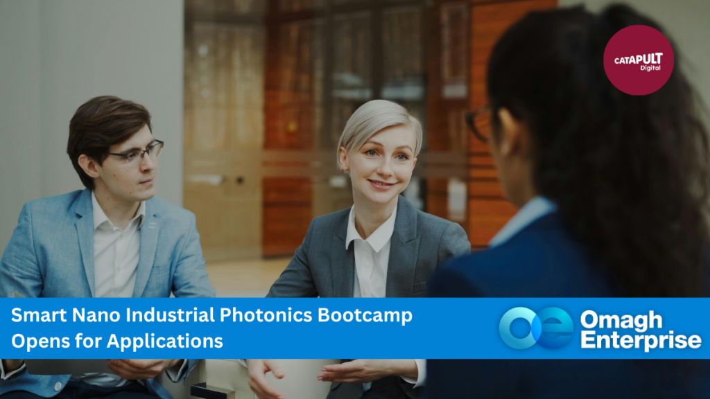 Three professionals in business attire have a meeting in a modern office. Text overlay announces the opening of applications for the Smart Nano Industrial Photonics Bootcamp by Omagh Enterprise.
