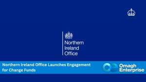 Northern Ireland Office logo on a blue background with text: "Northern Ireland Office Launches Engagement for Change Funds" and Omagh Enterprise logo.