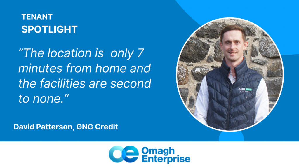David Patteron in a GNG Credit vest stands by a stone wall, accompanied by a quote about workplace location and facilities, with Omagh Enterprise branding.