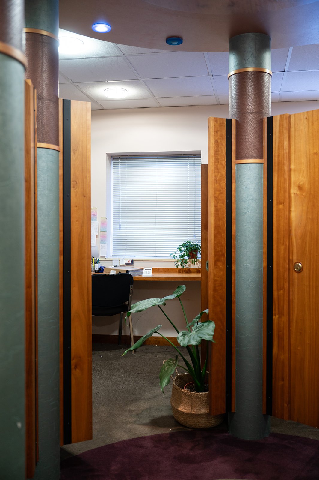 Private cubicle desk with chair and window at Omagh Enterprise, Great Northern Road, Omagh